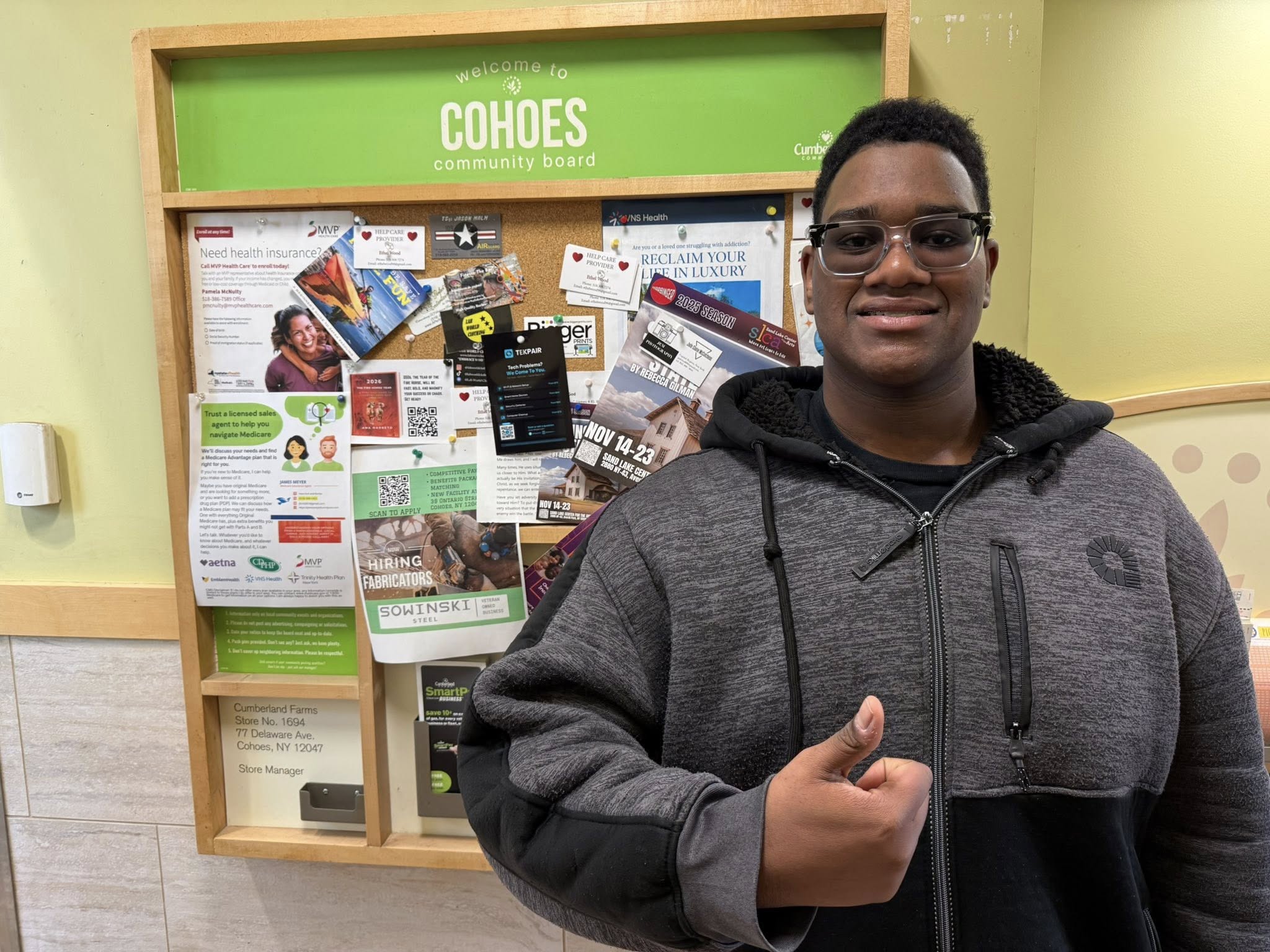 Tekpair flyer on the Cohoes community board at Cumberland Farms